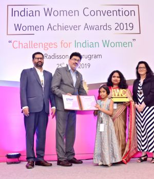 Recognition wall showcasing awards and achievements of Amarpushp
